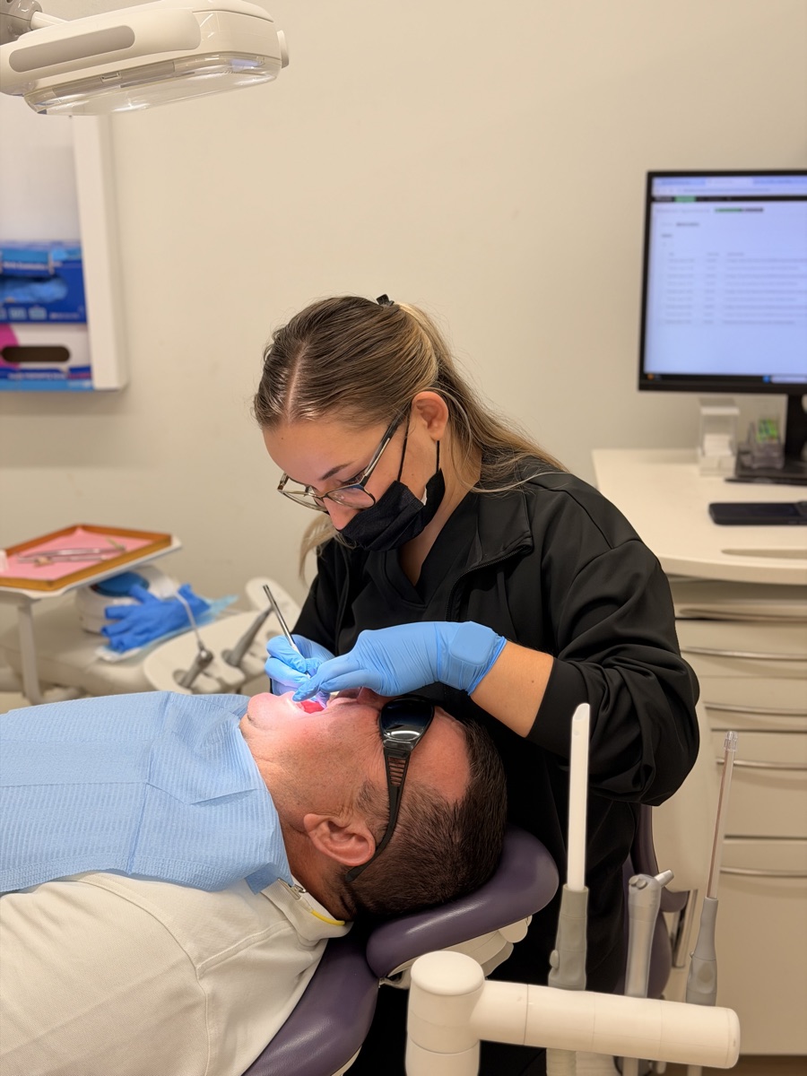 Dr. Paula Achim treating a patient